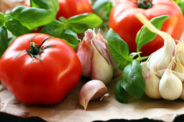 large tomatoes with basil and garlic