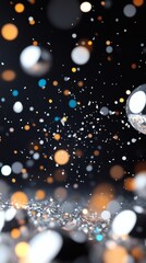 Obraz premium Glittering lights and shimmering spheres creating a festive atmosphere, with bokeh effect and bright colors. The composition focuses on vibrant particles, creating a dreamy feeling