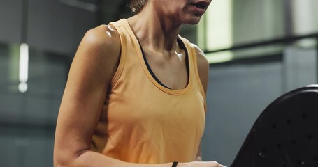 Padel sport, woman and breathing on court for match practice, intense workout or waiting on ball. Fitness, person and playing tennis at indoor health club for competition training, exercise and sweat - Powered by Adobe