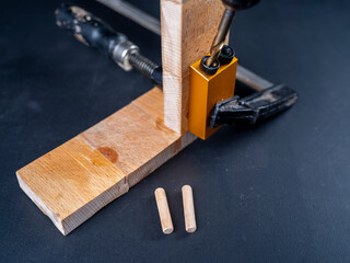 View of the workbench with accessories and tools for joining wood.