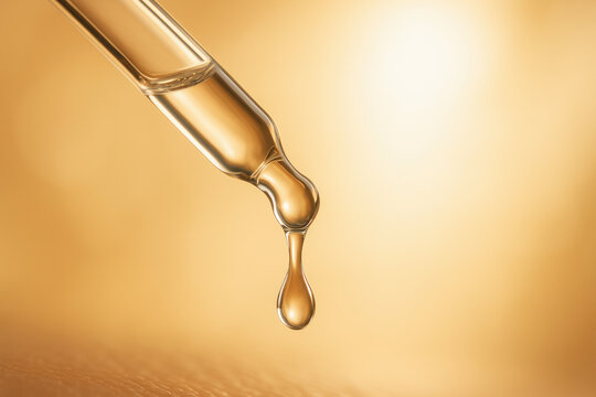 Gold serum drop collagen boost skincare routine nourishing face oil for glowing skin gentle hydrating elixir that boosts collagen and renews skin texture