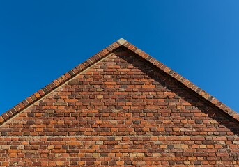 An old red brick house gable