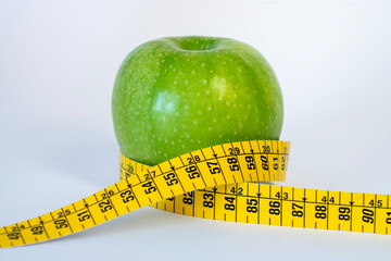 ma&ccedil;&atilde; com fita m&eacute;trica enrolado &aacute; sua volta