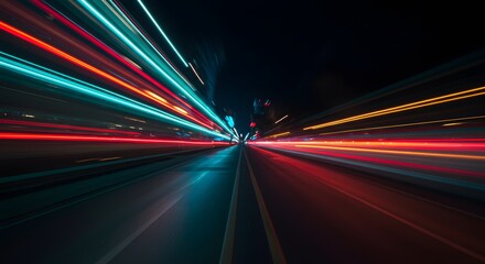 Vivid Light Trails on Dark Road at Night Creating Dynamic Motion Effect