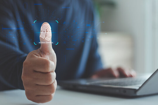 Businessman hand showing fingerprint scan with digital access control icon, concept of biometric security, identity verification, authentication system, data protection and cybersecurity technology.