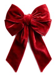 Luxury oversized christmas velvet bow in rich burgundy red with layered folds and decorative ribbon tails isolated on white