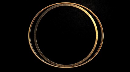 Two circles of light gold shine against a dark and grainy background