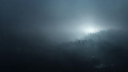 Mysterious fog covering dark, empty space of abstract landscape, creating ethereal atmosphere with soft light filtering through, emphasizing tranquility and solitude. Copy space.