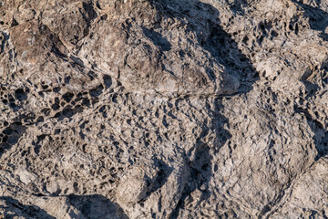 Haloclasty ( salt weathering), Tafoni. Basalt. Napili Bay, West Maui, Hawaii. Lava flows, Honolua Volcanics ( Pleistocene ), West Maui Volcano. 