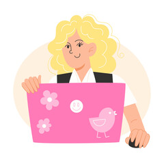 Blonde woman in a vest works on a pink laptop with a bird sticker