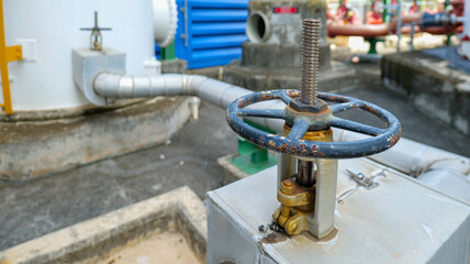 Gate valves installed on insulated fluid pipeline system in an industrial factory, emphasizing heat protection, safety, efficiency,