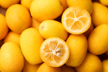 Fresh kumquats fruit texture background