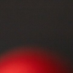 Red Glow on Dark Background — Abstract Light Diffusion with Moody Contrast
