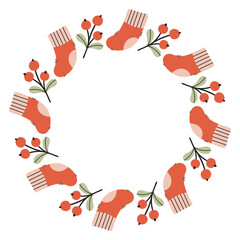 A festive round frame with red berries and red socks. The simple vector design perfect for Christmas and New Year decorations or holiday greetings.