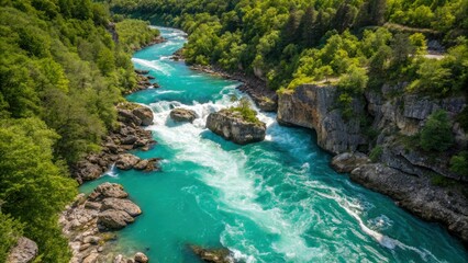Stunning aerial view of turquoise river winding through lush green forest, rocky cliffs, and whitewater rapids in vibrant natural landscape
