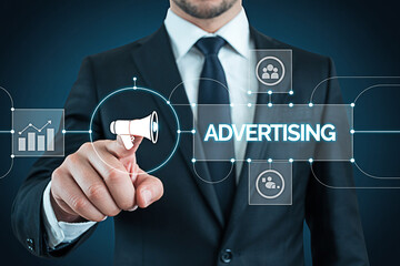 Businessman touching advertising interface with digital marketing tools on a virtual screen