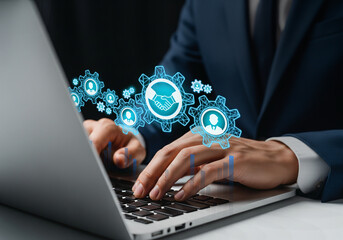 Digital Collaboration in Modern Business Operations, Laptop surrounded by glowing gear icons for teamwork and HR