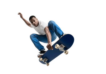 A Skateboarder Doing a Kickflip Mid-Air Demonstrates Skill and Agility