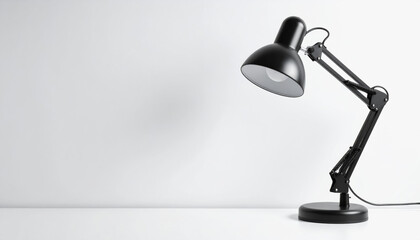 Stylish desk lamp set on a minimal white background with empty wall space behind for copy space and design