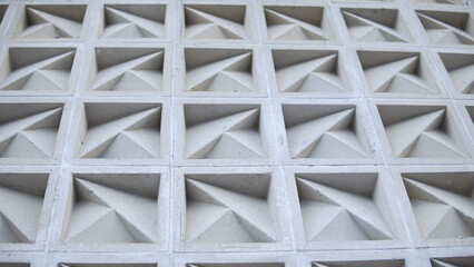 Modern Architectural Concrete Wall with Geometric Triangular Pattern