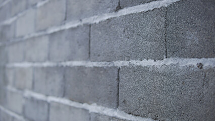 Textured Gray Concrete Block Wall with Strong White Mortar Lines