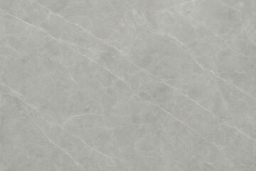 Fototapeta premium Polished gray marble surface with subtle veining seamless stone texture background