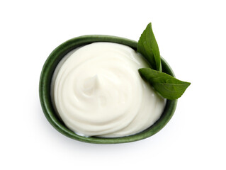Bowl with tasty sour cream and fresh basil on white background, top view