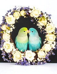 Two Lovebirds Kissing in a Floral Wreath