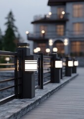 Obraz premium Illuminated pathway along a wooden deck, leading to a multi-story building at dusk