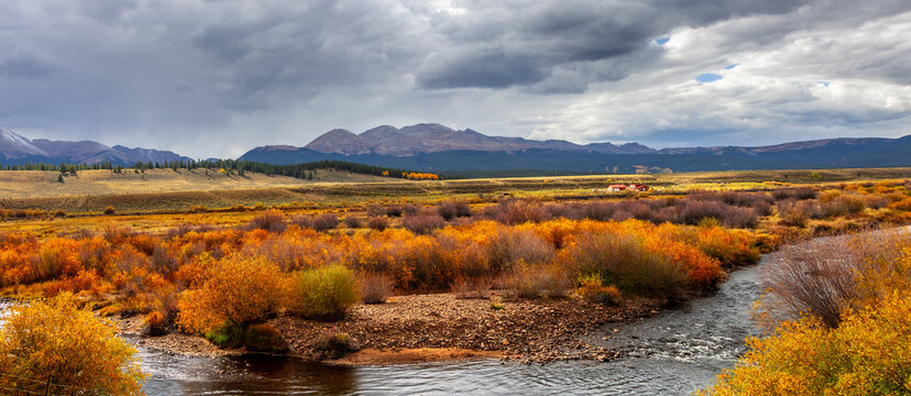 Scenic panoramic view of Reddy State Wildlife Area along Arkansas River in Colorado, USA with brilliant foliage in autumn time.
