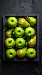 Fruits in dark wood tray, top-down