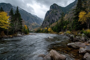 Autumnal river flowing through a mountain valley