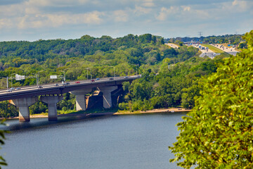 Giant freeway transporting vehicles over a large river on route between Minnesota and Wisconsin USA