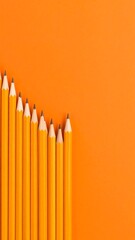 Pencils on orange (1)
