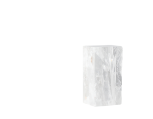 Raw selenite crystal tower isolated on a white background.