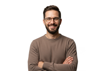 Man with beard and glasses smiles confidently with arms crossed indoors studio portrait transparent background
