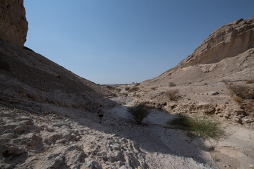 Scenic landscapes and mountain roads around Jebel Hafeet in Al Ain, United Arab Emirates, showing desert terrain, rocky hills, and winding routes under clear skies.