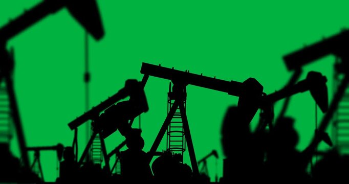 Animation of working pumpjacks over transparent background