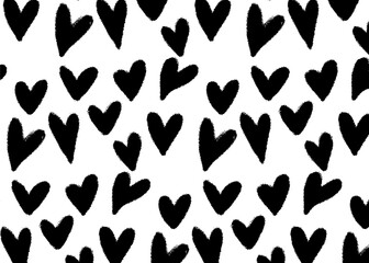 A pattern of black hearts on a white background, creating a simple and repetitive design.