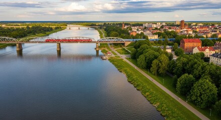 Obraz premium Breathtaking aerial view of a european city featuring a river and a bridge