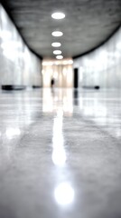 A sleek, modern corridor with polished flooring and ambient lighting.