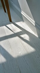 Aesthetic shadows cast on light wooden floor in a modern space.