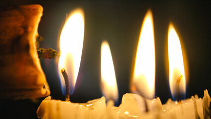 Process of lighting ornamental candles for illumination at romantic gatherings