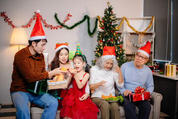 Capture the joy of Christmas with a cheerful family sharing smiles, gifts, and festive moments under a decorated tree