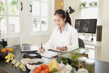 Nutritionist woman in lab coat analyzing vegetables in a modern food science lab. Healthy lifestyle, diet research, clinical testing