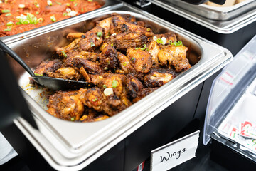spicy chicken wings in Chaffin dish at Party Celebration