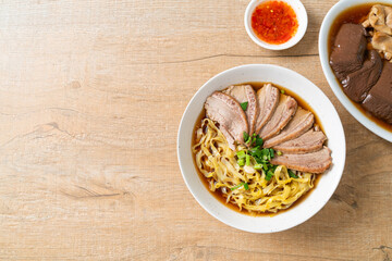 egg noodles with stewed duck in brown soup