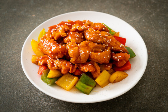 fried crispy chicken with sweet and sour sauce