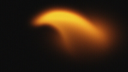 Abstract glowing orange flame shape against a dark background