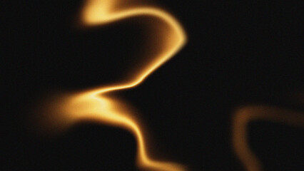 Abstract golden swirling flames on black background